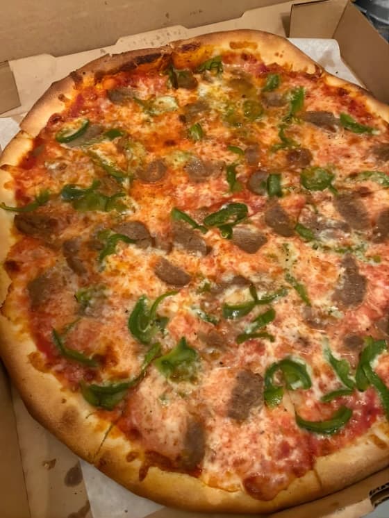 Experience the vibe of Downtown Pizza in Lake Worth Beach, Florida.